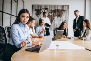 group of people working out business plan in an office