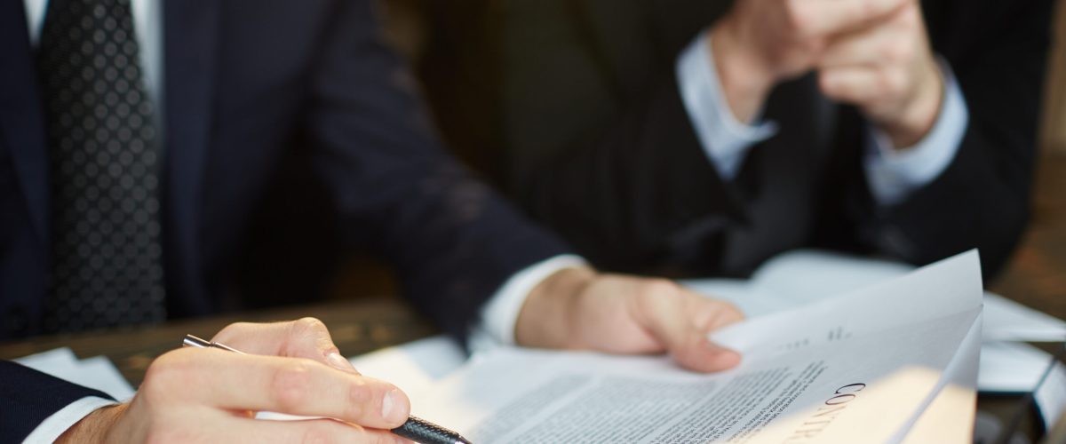businessman reading contract